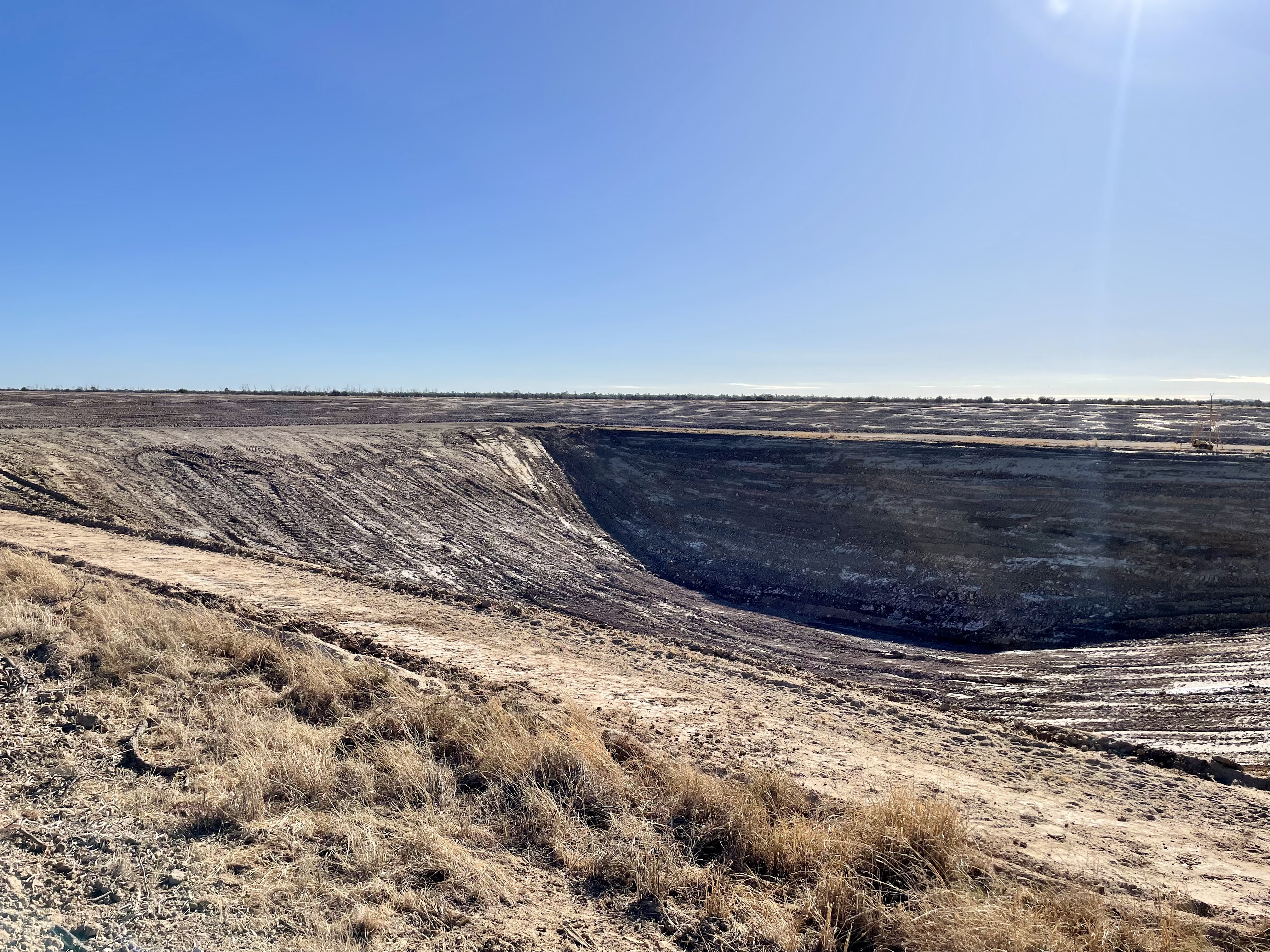 Massive dam excavation showing scale