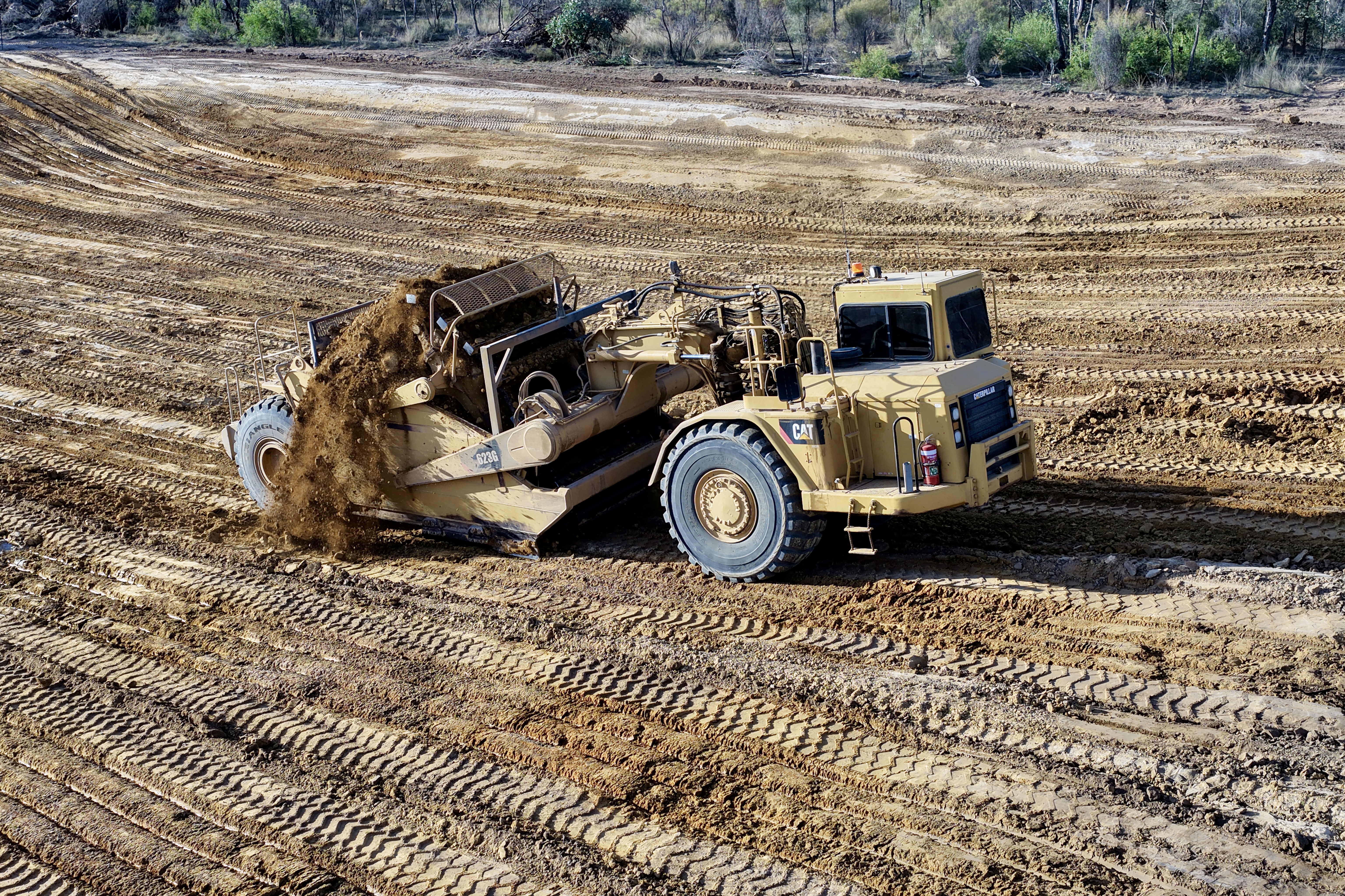 CAT scraper moving earth across Central Queensland