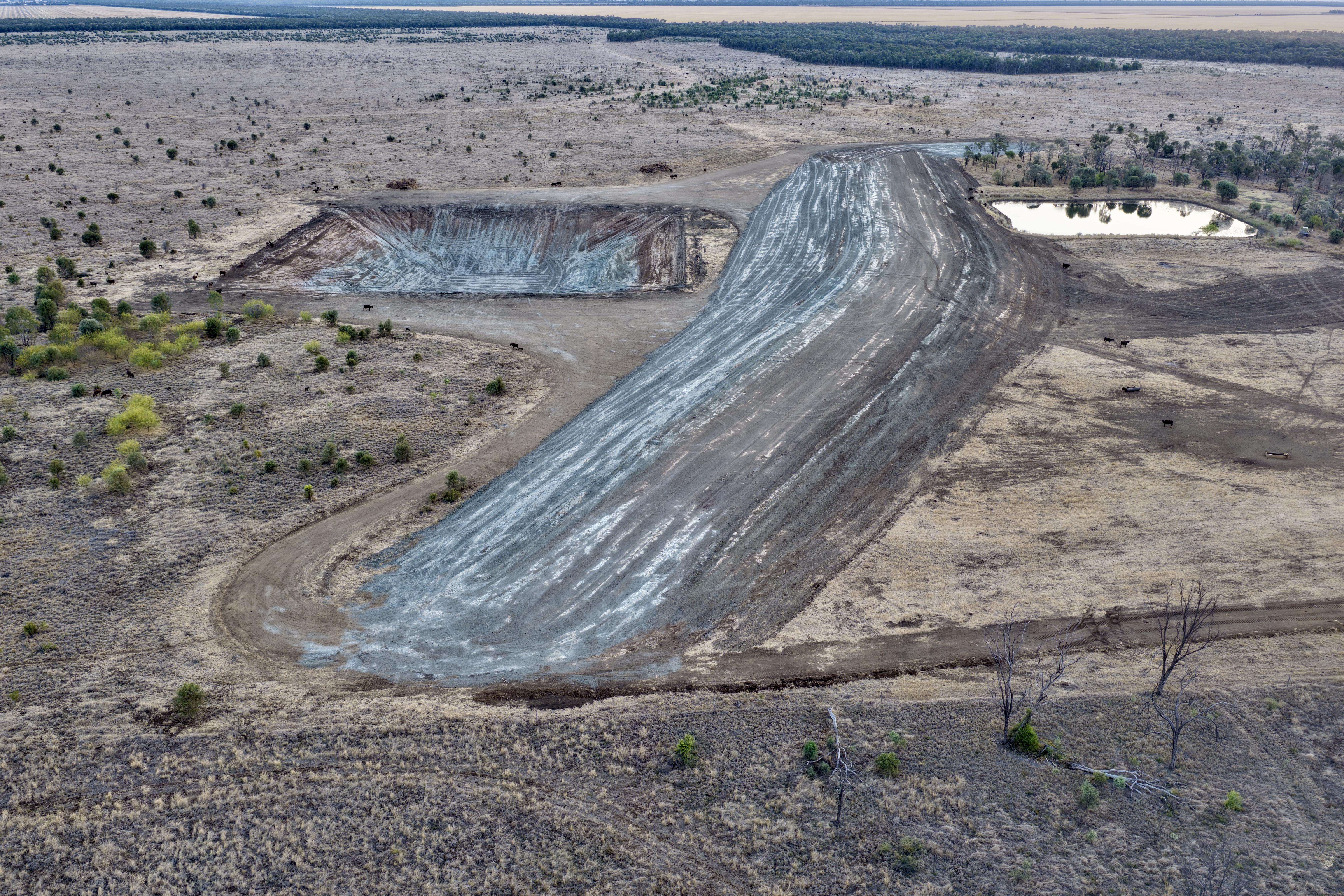 Aerial view of dam and water storage infrastructure built in Queensland