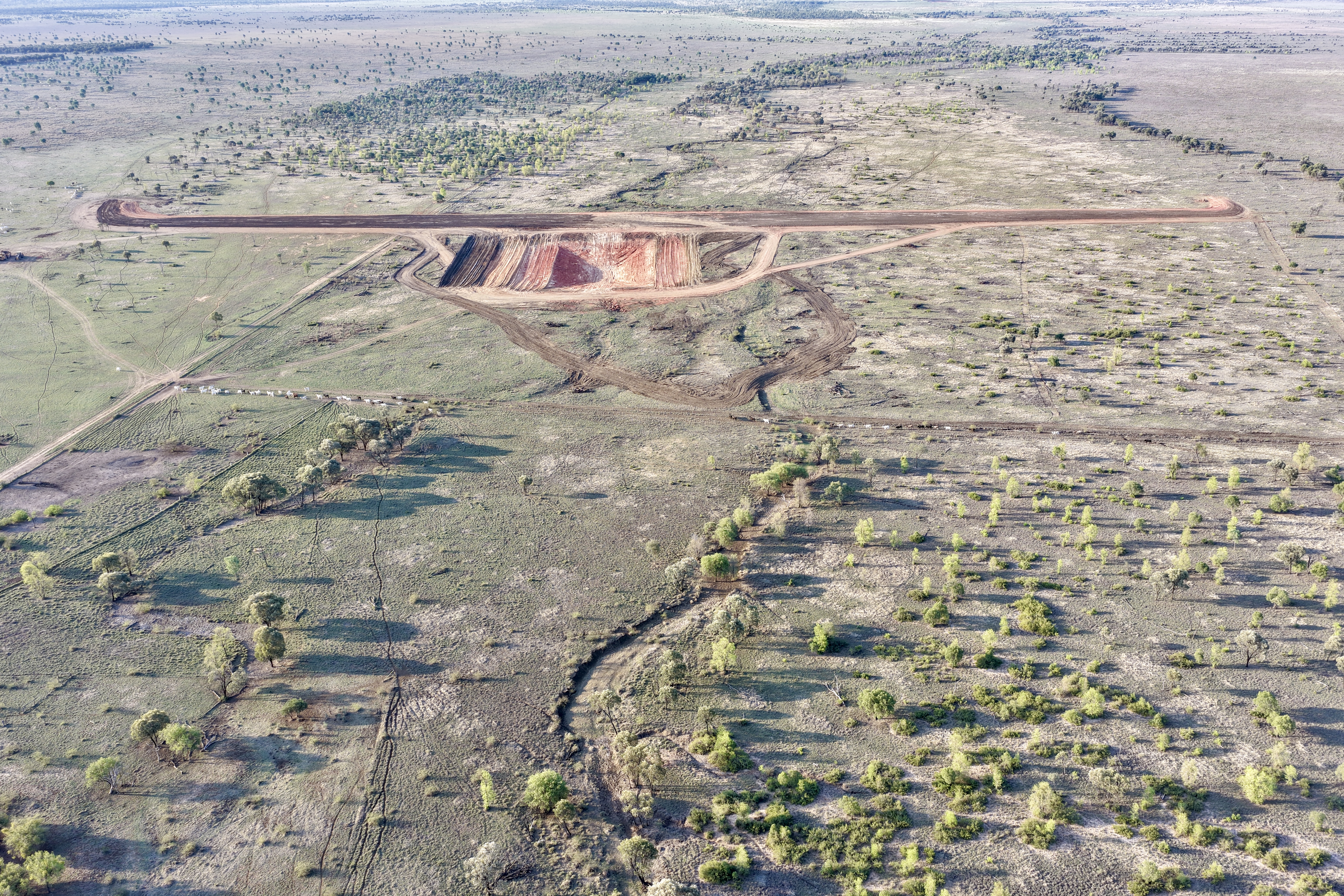 Aerial view of dam construction project by HE Earthmoving in Central Queensland